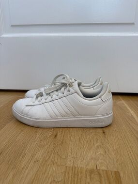 adidas Off-White Leather Low-Top Sneakers with Gold Accents